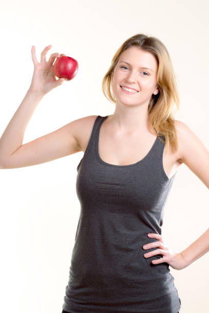 istock cute girl loves her apple 1137324079