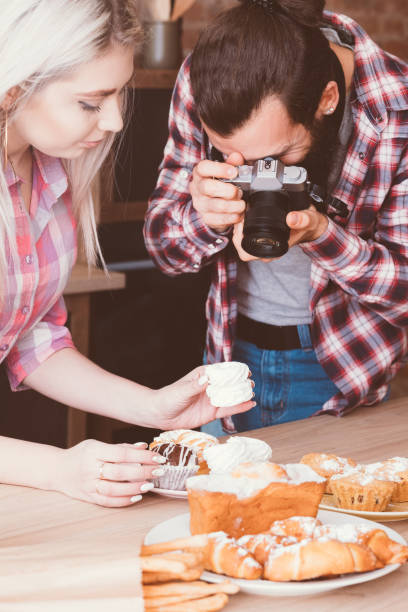 istock food photographer man assistant cakes pastries 1137325930