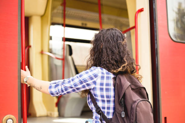 istock Girl comes into compartment from corridor of train, a trip in summer 1137326103
