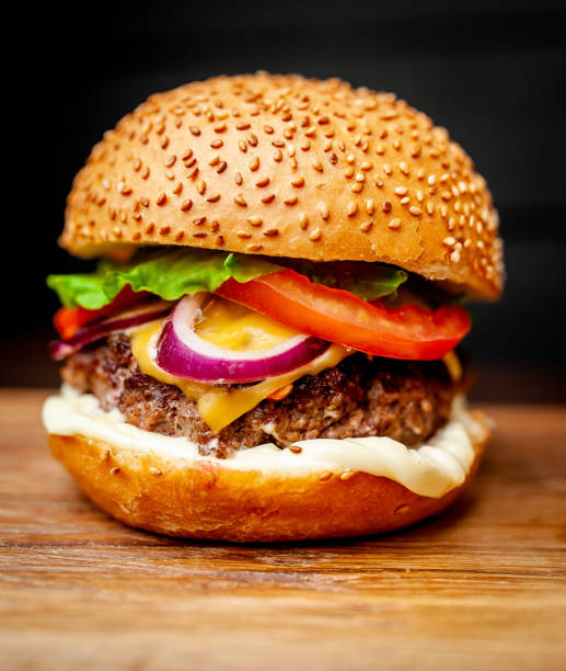 istock Delicious fresh homemade burger on a cutting board 1137327791