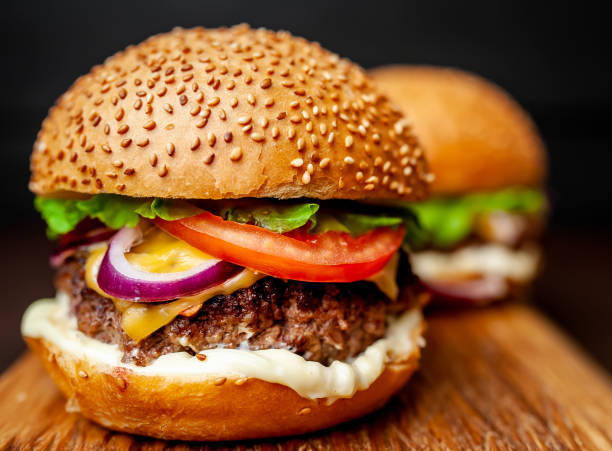 istock Two Delicious Fresh Homemade Burger on a Cutting Board 1137327811