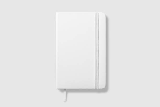 Top view of Blank photorealistic notebook mockup on light grey background.