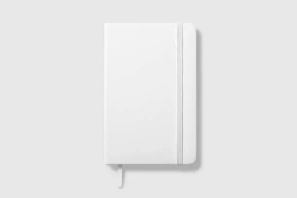 Top view of Blank photorealistic notebook mockup on light grey background, 3d illustration.