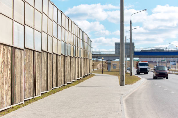istock Sound absorbing panels along freeway in city 1137331526