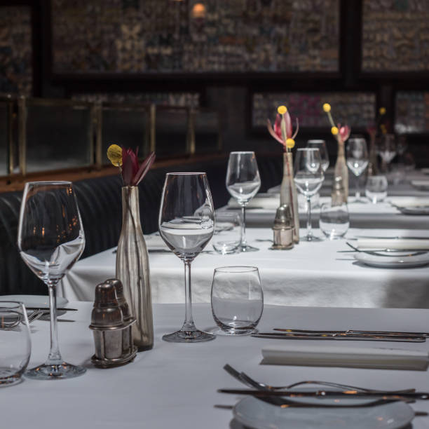 istock Interior of a modern restaurant with tables served for dinner 1137331683