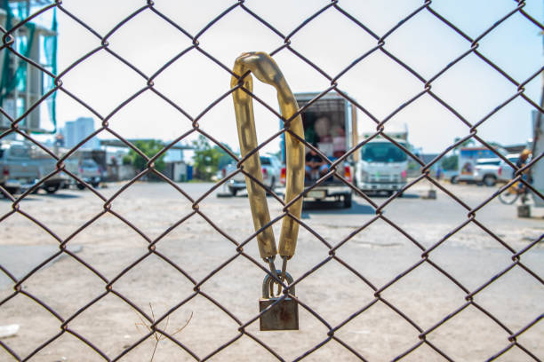 istock Rusty metal gate locked with Padlock, Outdoor 1137331723
