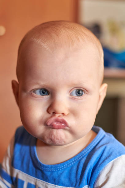 istock Portrait of a funny boy who grimaces 1137332823