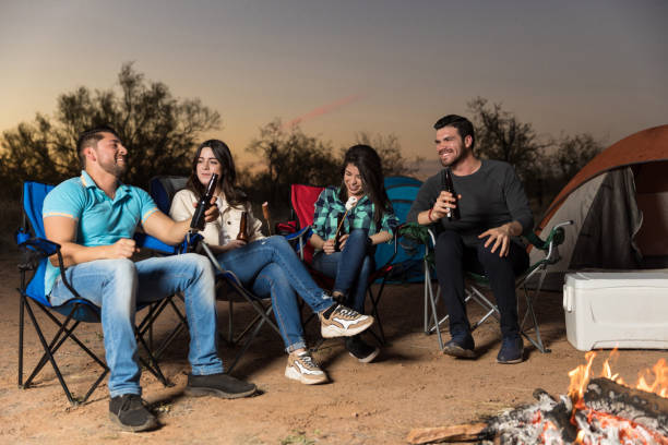 istock Couples Having Fun Near The Bonfire 1137334562