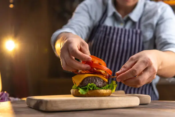 Chef preparing a hamburger