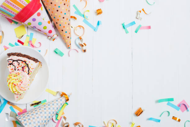istock birthday cake and  decoration on white wooden background 1137337408