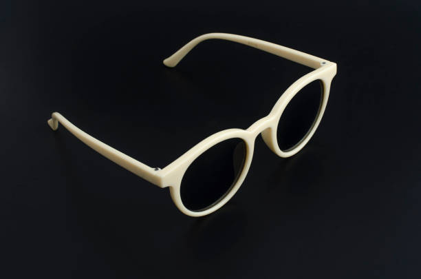 istock round retro sunglasses in plastic rim isolated on black 1137338677