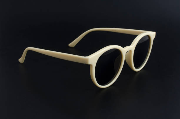 istock round retro sunglasses in plastic rim isolated on black 1137338684