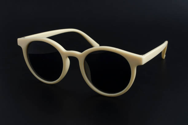 istock round retro sunglasses in plastic rim isolated on black 1137338964