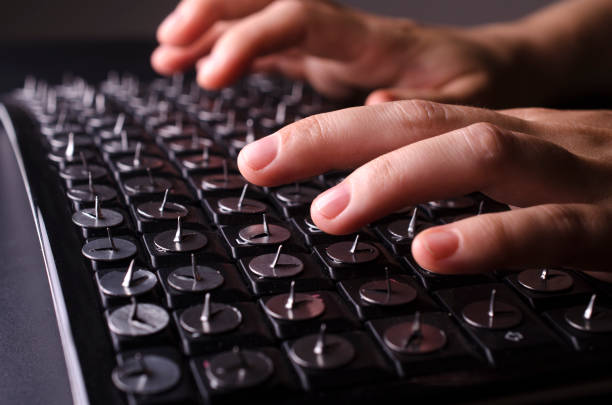 istock Hands above the keyboard with paper clips 1137339208