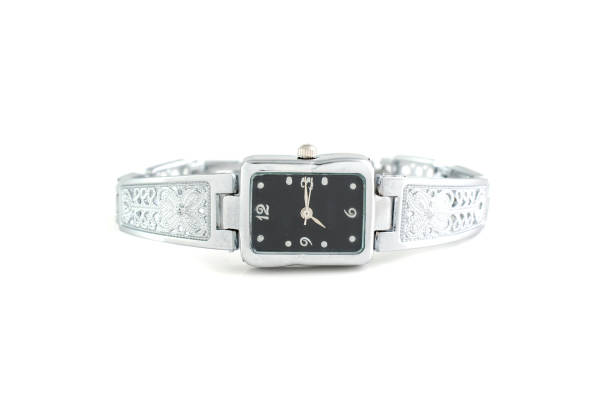 istock Women's silver wrist watch isolated on white 1137339747