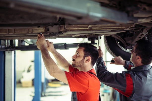 istock Auto mechanic working in garage. Repair service. 1137339774