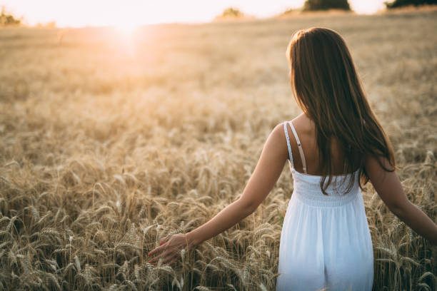 istock Young beautiful woman spending time in nature 1137340260
