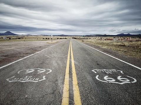 Street sign on historic route 66 on asphalt of country road