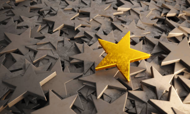 istock Golden Star Standing Out From The Crowd 1137341590