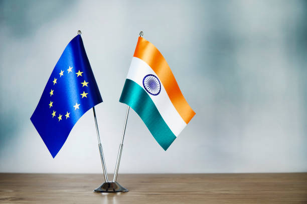 istock European Union and India flag standing on the table 1137341729