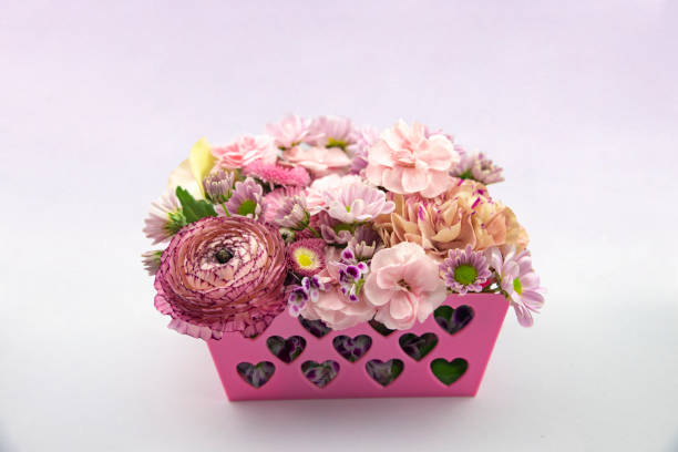 istock Romantic floral arrangement in a basket 1137342005