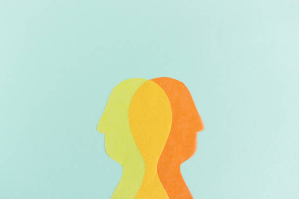 istock Transparent paper heads looking in different directions 1137342978