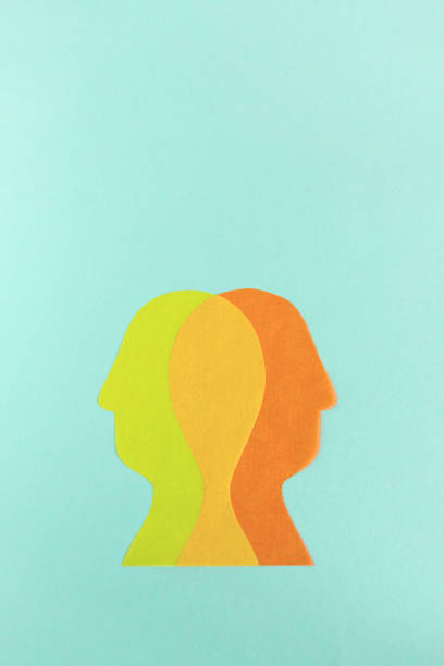 istock Yellow and orange people silhouettes 1137342998