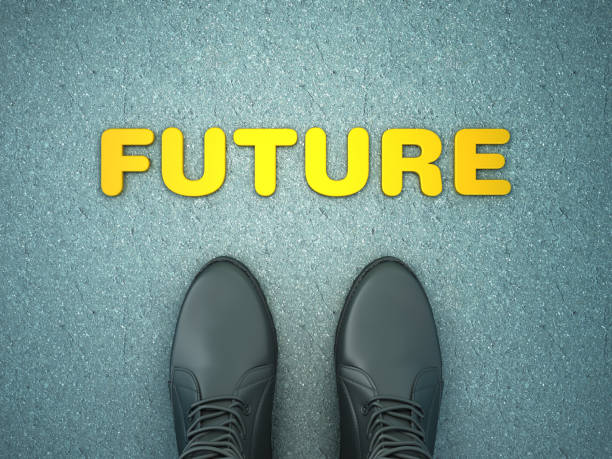 istock Feet on Asphalt Road with FUTURE Word - 3D Rendering 1137343376