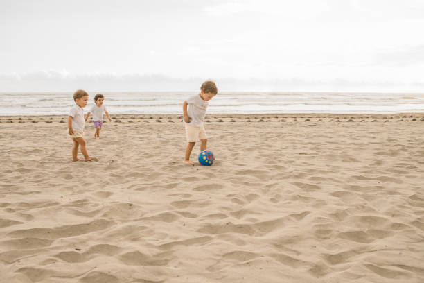 istock Family Playing Soccer 1137343545