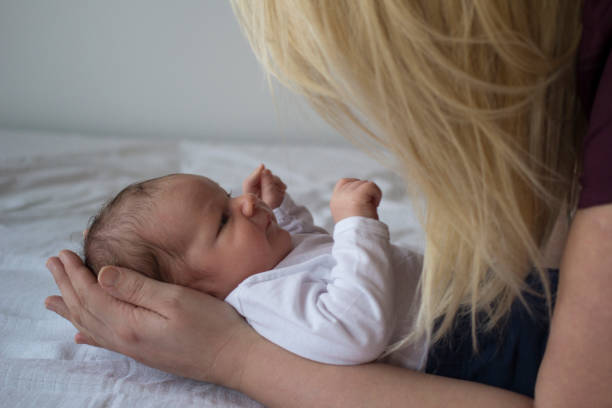 istock Newborn baby boy with his mother 1137344545