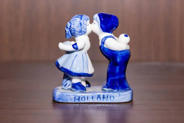 Photo of Delft Blue Figurine of kissing Dutch couple. Souvenier from Holland/Netherlands.