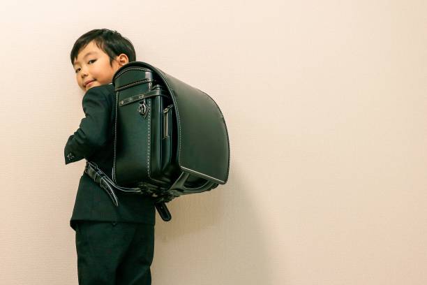 Japanese boy and new school bag stock photo