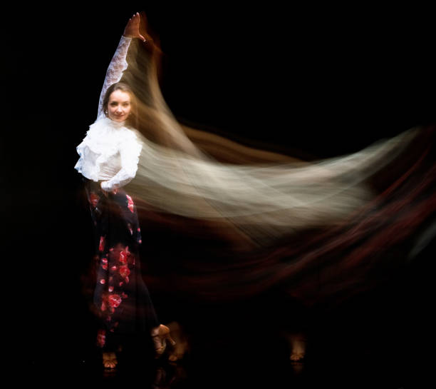 istock Beautiful female ballroom dancing - motion blur 1137354472