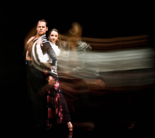 istock Attractive ballroom dancing couple 1137354494