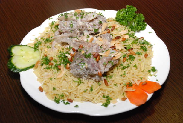 istock rice with vegetables and meat, seasoned with pine nuts and spices 1137355297