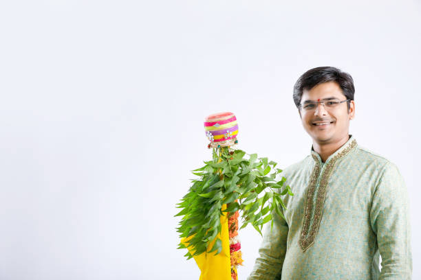 gudi padwa marathi new year , young indian celebrating gudi padwa festival - kurta imagens e fotografias de stock