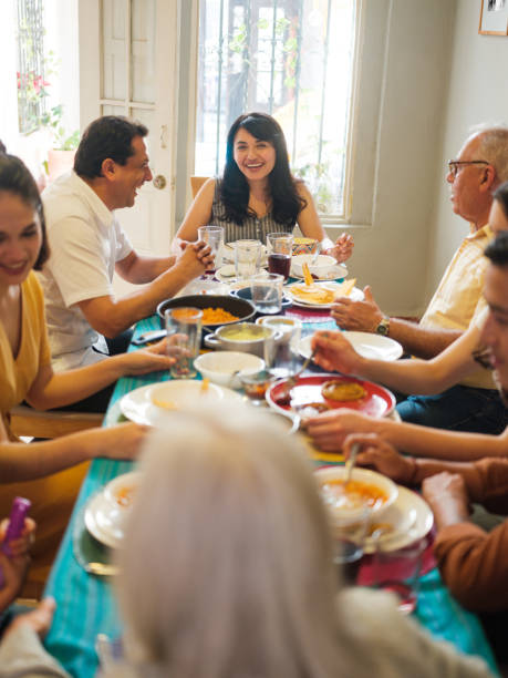 istock Mexican family enjoying lunch together 1137356830