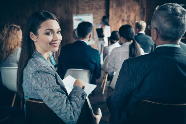 istock Nice elegant stylish sharks crowd audience listening attending presentation report strategy speaker ceo boss chief agent broker conference corporate at industrial loft work place space 1137357929