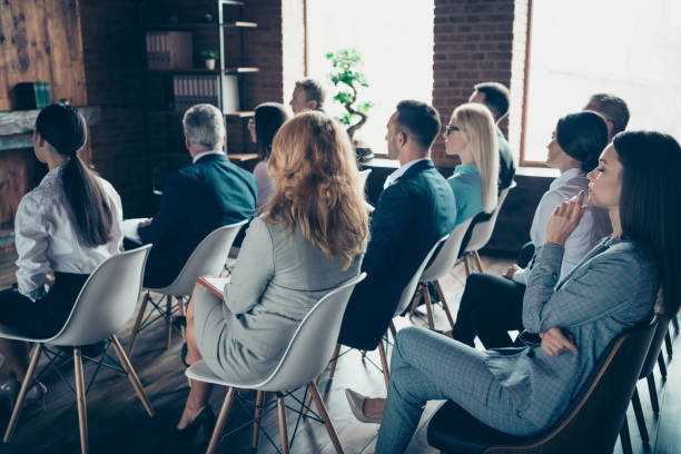 istock Profile side view of crowd nice trendy specialists experts sharks attending educative classes courses lecture corporate conference at industrial loft style interior work place station indoors 1137358860