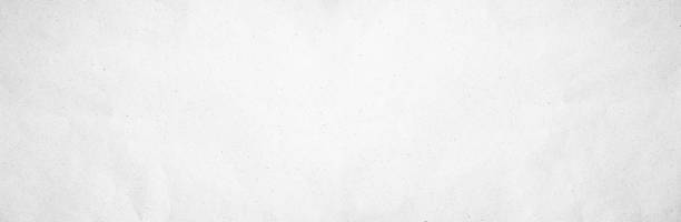 istock Table top back panorama gray line draw paper kraft background texture in soft white light color concept for page wide screen wallpaper design, flat rice grey surface for panoramic wall. plain cement 1137359279