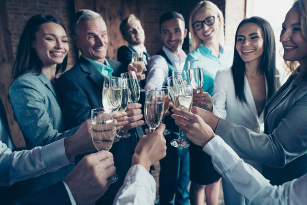 cropped close up photo business people crowd diversity different age race team building members gathering she her he him his clink golden wine beverage say toasts congrats formal wear jackets shirts - party business toast champagne imagens e fotografias de stock