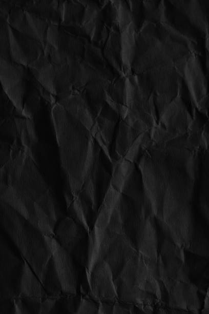 istock Dark black blank paper backgrounds creased crumpled surface old torn ripped posters grunge textures placard 1137361028
