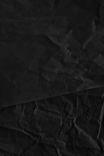 istock Dark black blank paper backgrounds creased crumpled surface old torn ripped posters grunge textures placard 1137361213