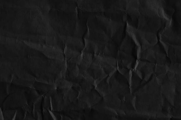 istock Dark black blank paper backgrounds creased crumpled surface old torn ripped posters grunge textures placard 1137361224