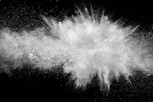 istock White powder explosion.Freeze motion of white dust particles on black background. 1137361456