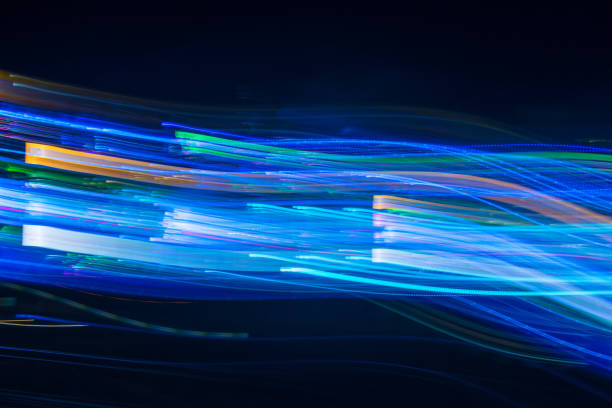 istock Abstract blurred light lines on black background. Light trails against dark background. 1137361471