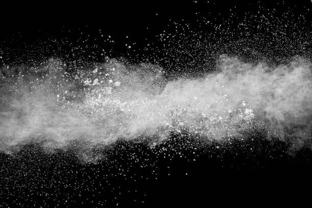 istock Bizarre forms of white powder explosion cloud against black background.White dust particles splash. 1137361522