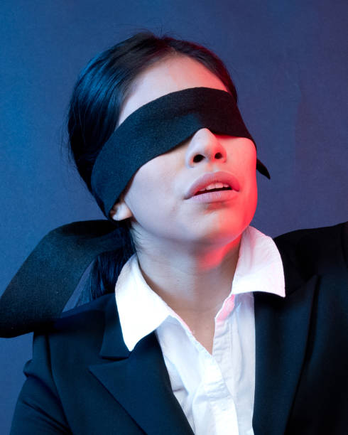 istock Beautiful latino businesswoman blindfolded 1137362524