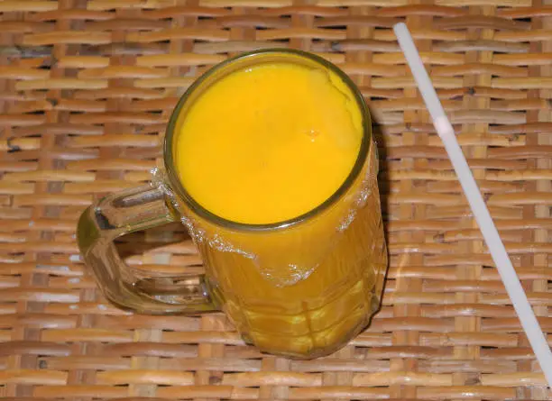 Photo of Mango juice glass film coated in Kochi, Kerala, India