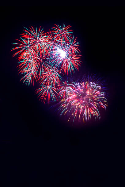 istock Beautiful colorful isolated firework display for celebration happy new year and merry christmas on black background 1137367864
